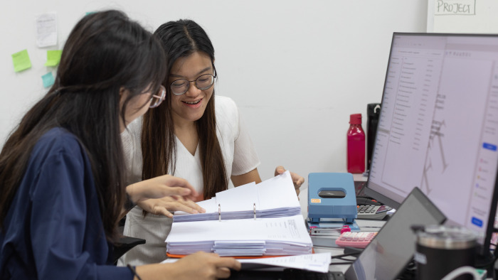 Parker Russell Singapore accounting services team members going through client's financial records